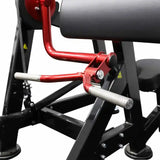 Close-up of the handle bar from a bicep curl machine with red and black components