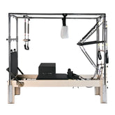 Pilates reformer machine on a white background
