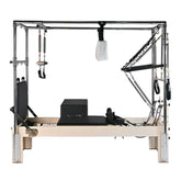 Pilates reformer machine on a white background