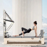 pilates reformer with half trapeze attachment