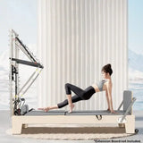 pilates reformer with half trapeze attachment