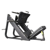 Black leg press machine with angled padded seat and footplate for gym workouts