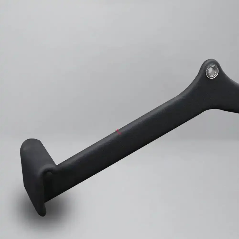 Black foam-padded attachment arm with metal eyelet on gray background, fitness accessory part