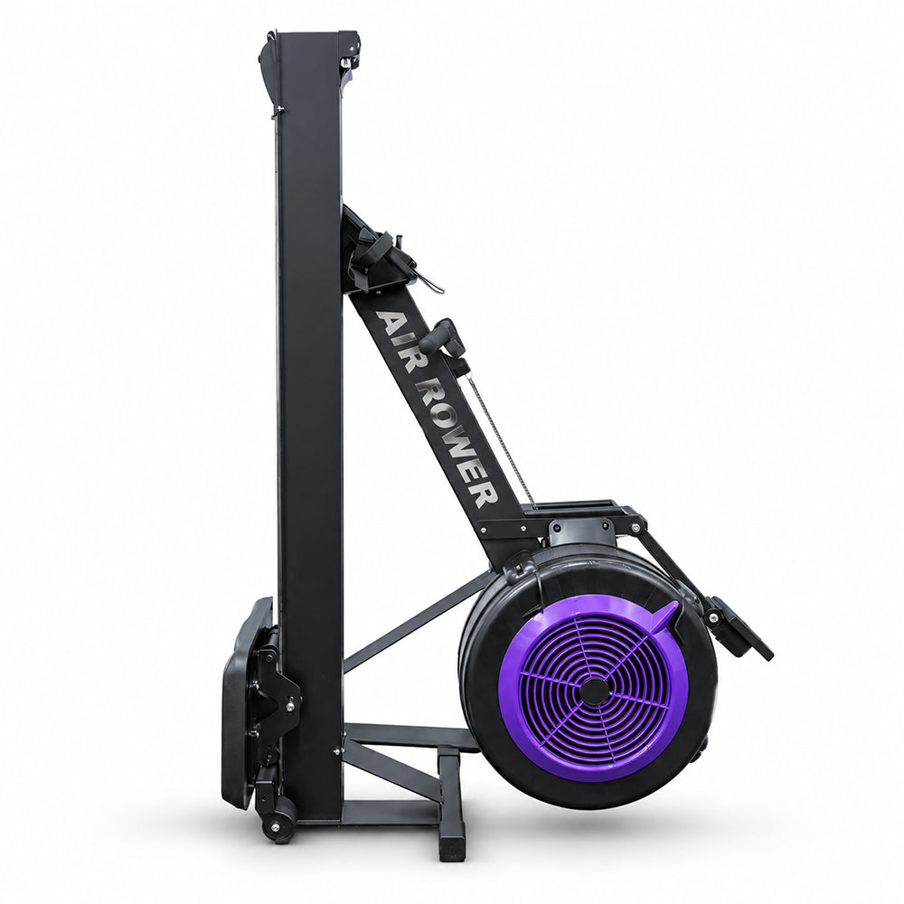 A black indoor rowing machine with a prominent purple fan housing and white 'AIR ROWER' branding, shown on a clean white background.