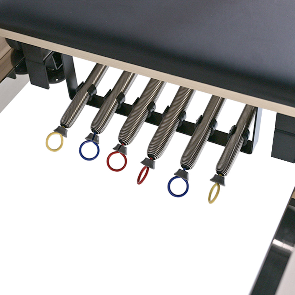 Close-up of the pilates springs on Pilates reformer PL-600 Pro