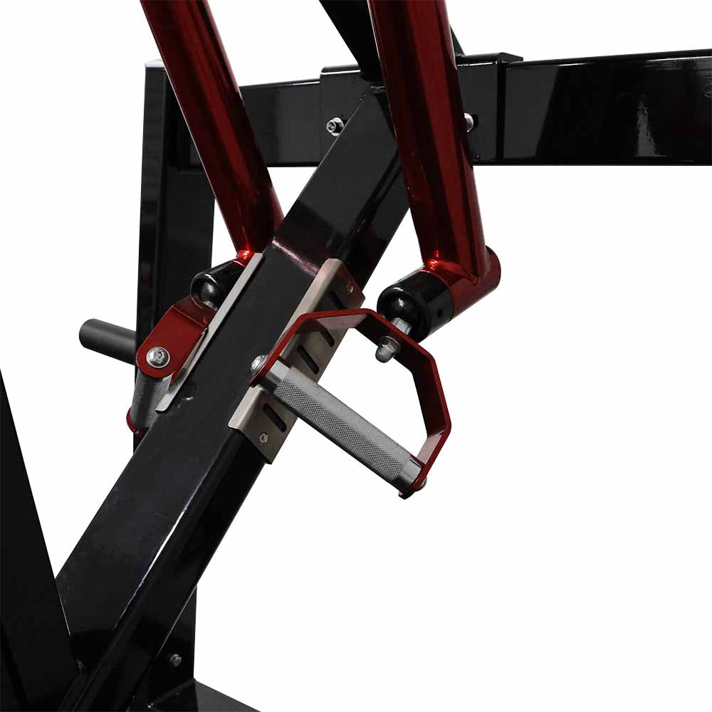 Close-up of a commercial black and red chest press machine, highlighting the handles and design details.