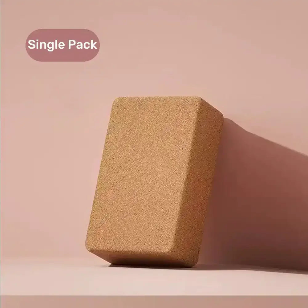 Cork yoga block on a pink background with 'Single Pack' text.