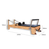 Wooden Pilates reformer with dimensions labelled on a white background