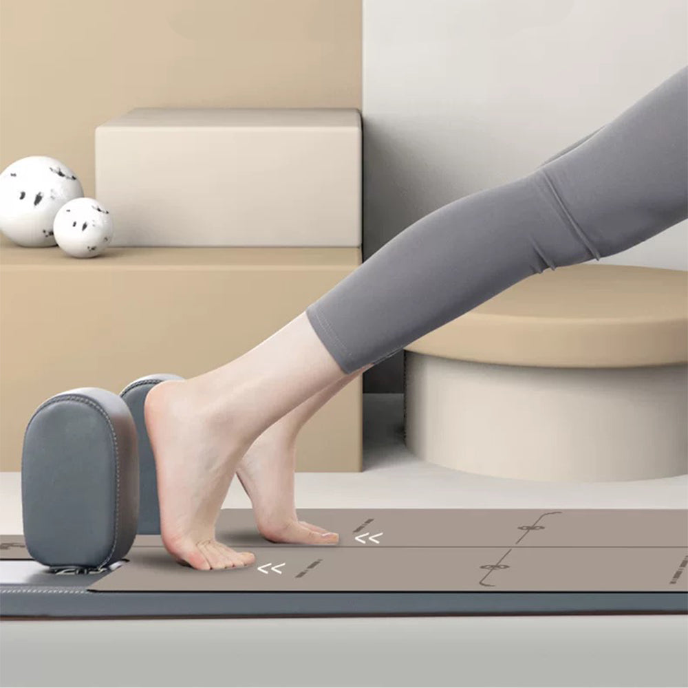 Person using a reformer mat platform