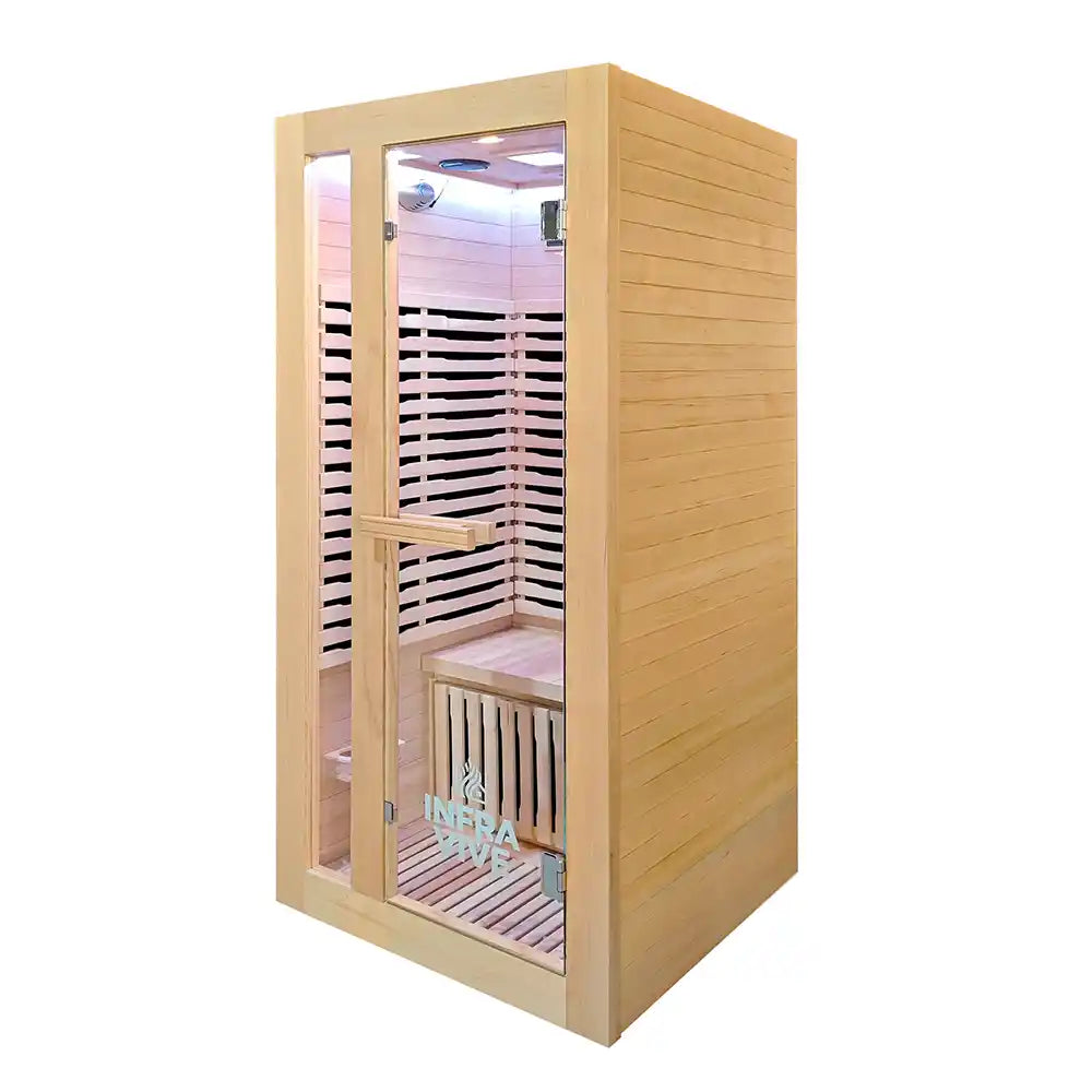 A wooden infrared sauna cabin with a light natural wood exterior, glass door, interior wooden shelves, and a visible LED light at the top, shown on a plain white background.