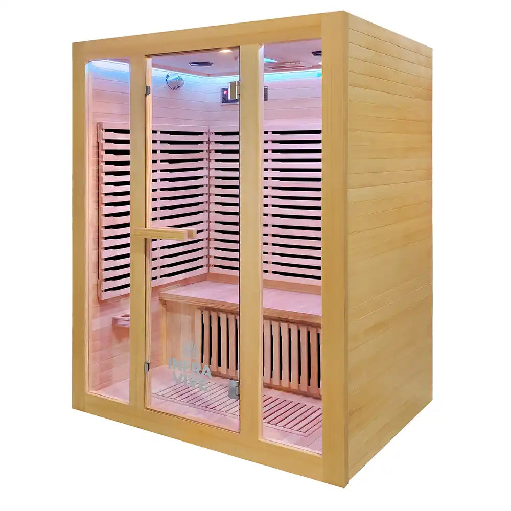 A wooden infrared 3 person sauna with glass doors, featuring light natural wood panels, interior shelves, and a pinkish-red ambient light inside, shown on a plain white background.